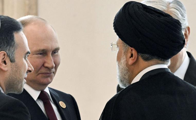 الرئيسان الروسي فلاديمير بوتين والإيراني إبراهيم رئيسي 