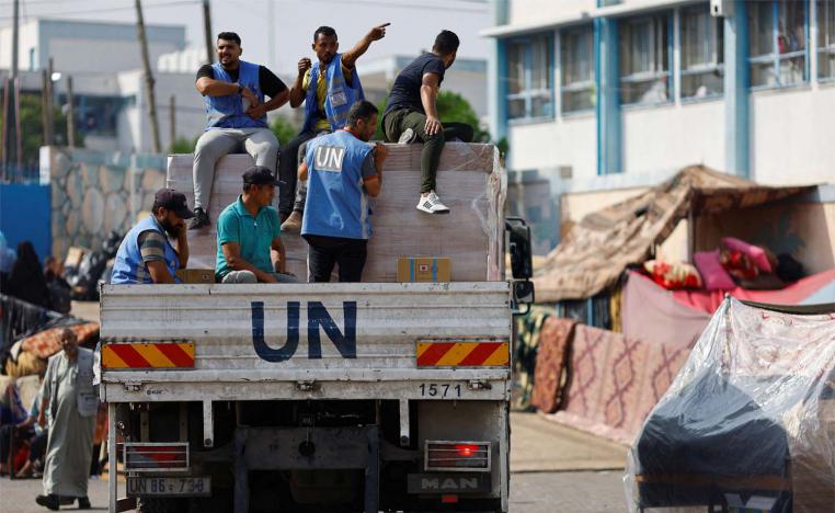 UN workers arrive to distribute aid to Palestinians in Khan Younis