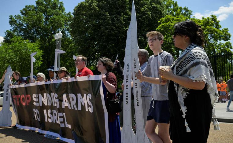Protesters gather outside the White House to call on the Biden administration to stop sending weapons to Israel