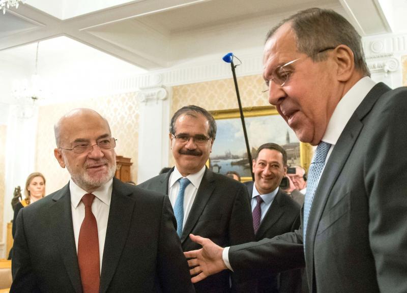 Russian Foreign Minister Sergei Lavrov (R) welcomes his Iraqi counterpart Ibrahim al-Jaafari during a meeting in Moscow, last February