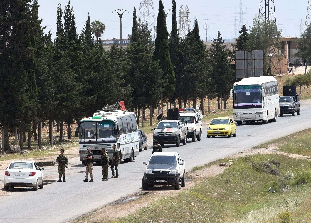 حافلات تقل المسلحين