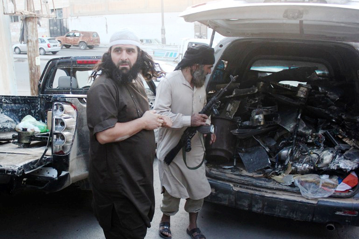 عناصر من داعش في الرقة حين كان التنظيم يسيطر على المدينة السورية