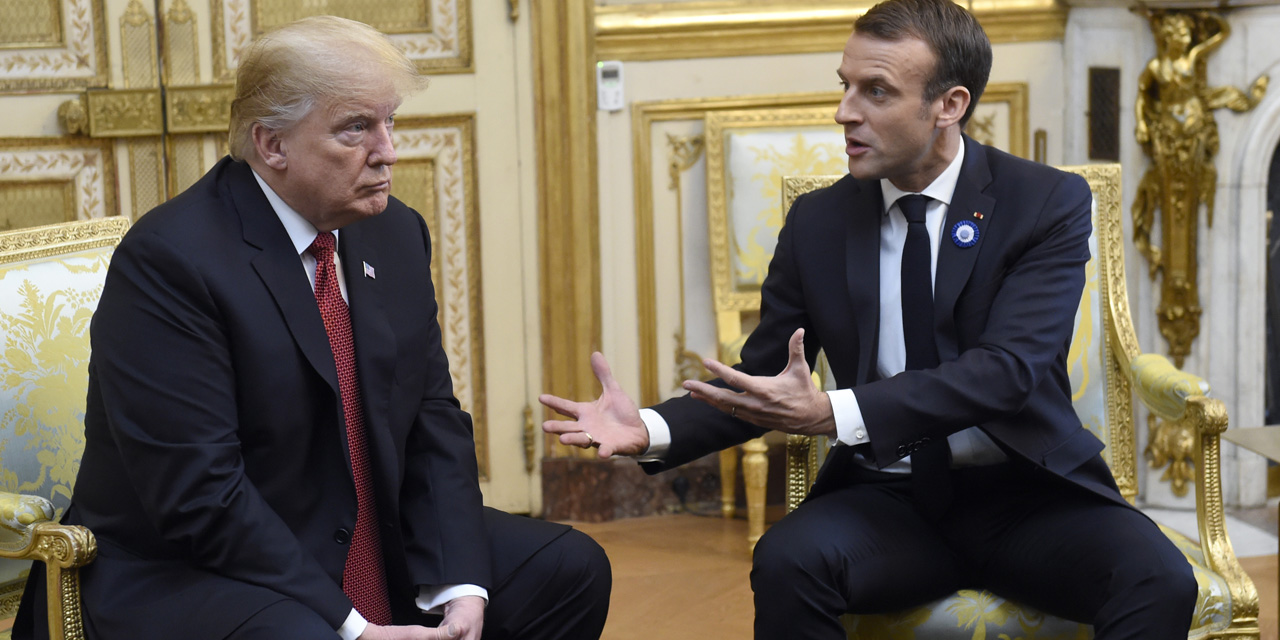 الرئيسان الأميركي دونالد ترامب والفرنسي امانويل ماكرون في لقاء على هامش مئوية الحرب العالمية الأولى