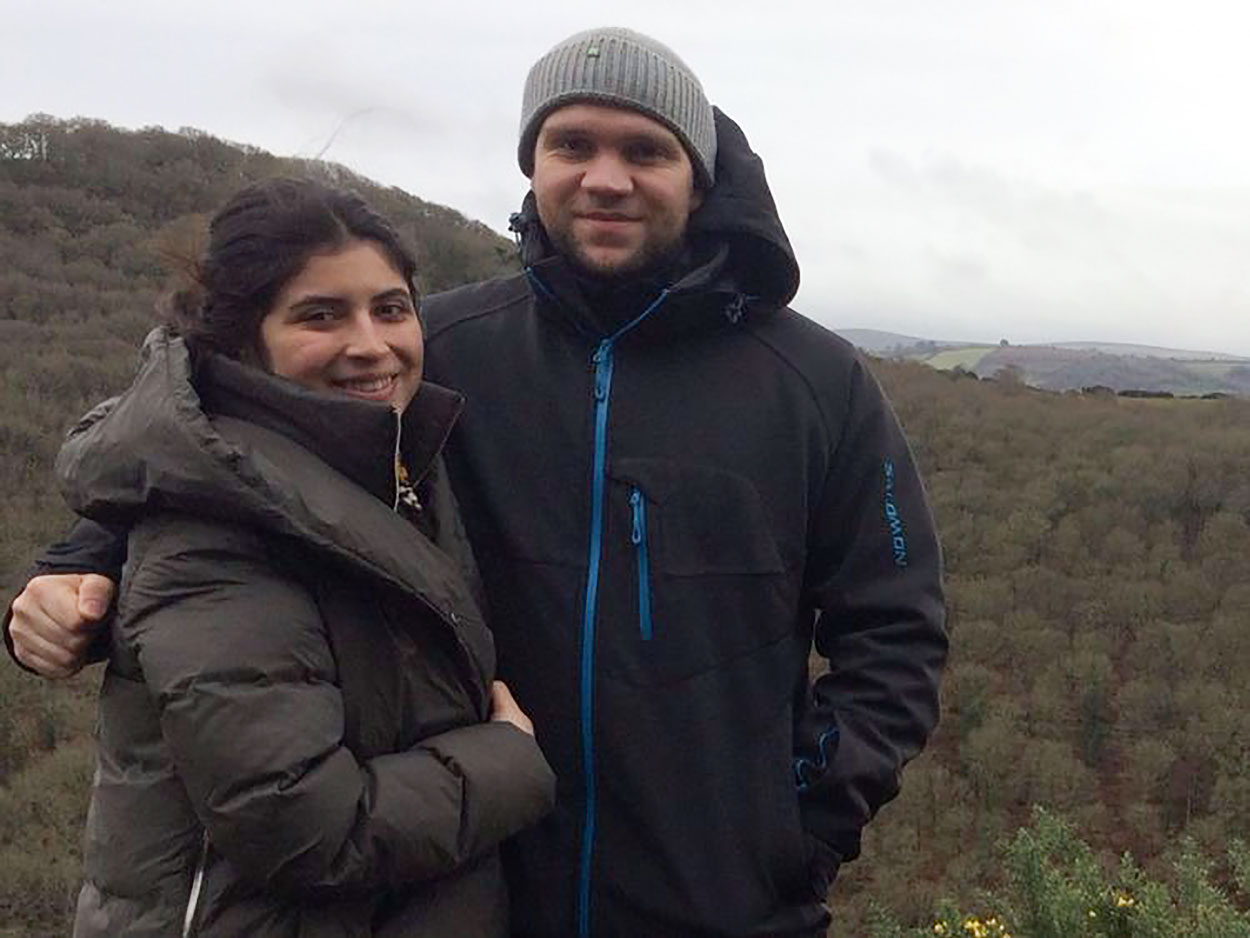 Photo released by the family of British student Matthew Hedges shows him (R) and his wife Daniela Tejada (L) posing in an undisclosed location.