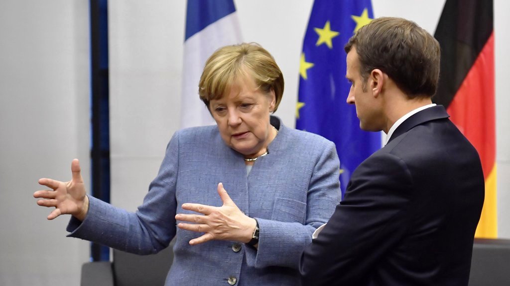 المستشارة الألمانية انجيلا ميركل والرئيس الفرنسي امانويل ماكرون