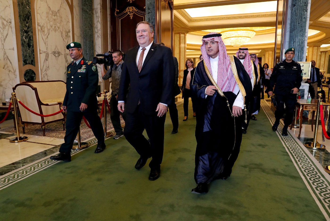 U.S. Secretary of State Mike Pompeo walks with Saudi Foreign Minister Adel al-Jubeir in Riyadh, Saudi Arabia, October 16, 2018.