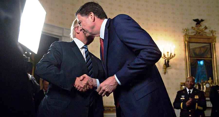 المدير السابق لاف بي اي جيمس كومي في لقاء سابق مع الرئيس الاميركي دونالد ترامب 