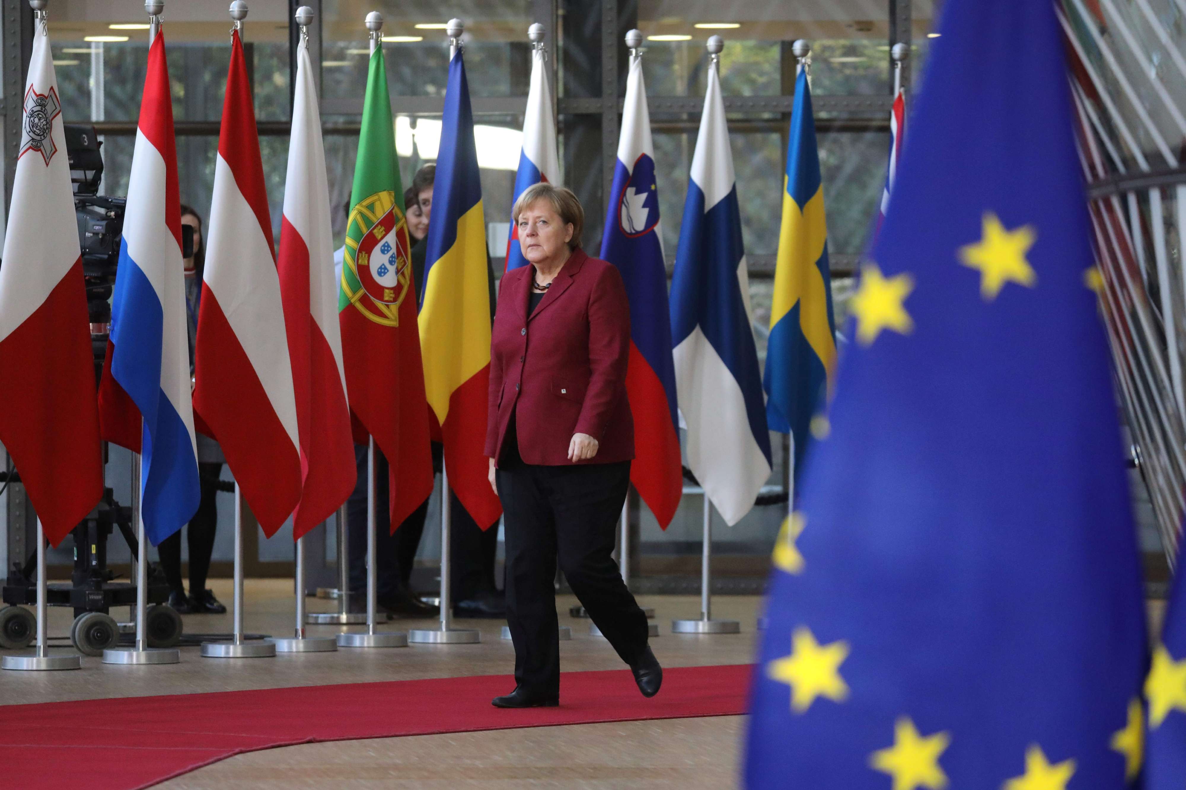 ميركل في قمة بروكسل