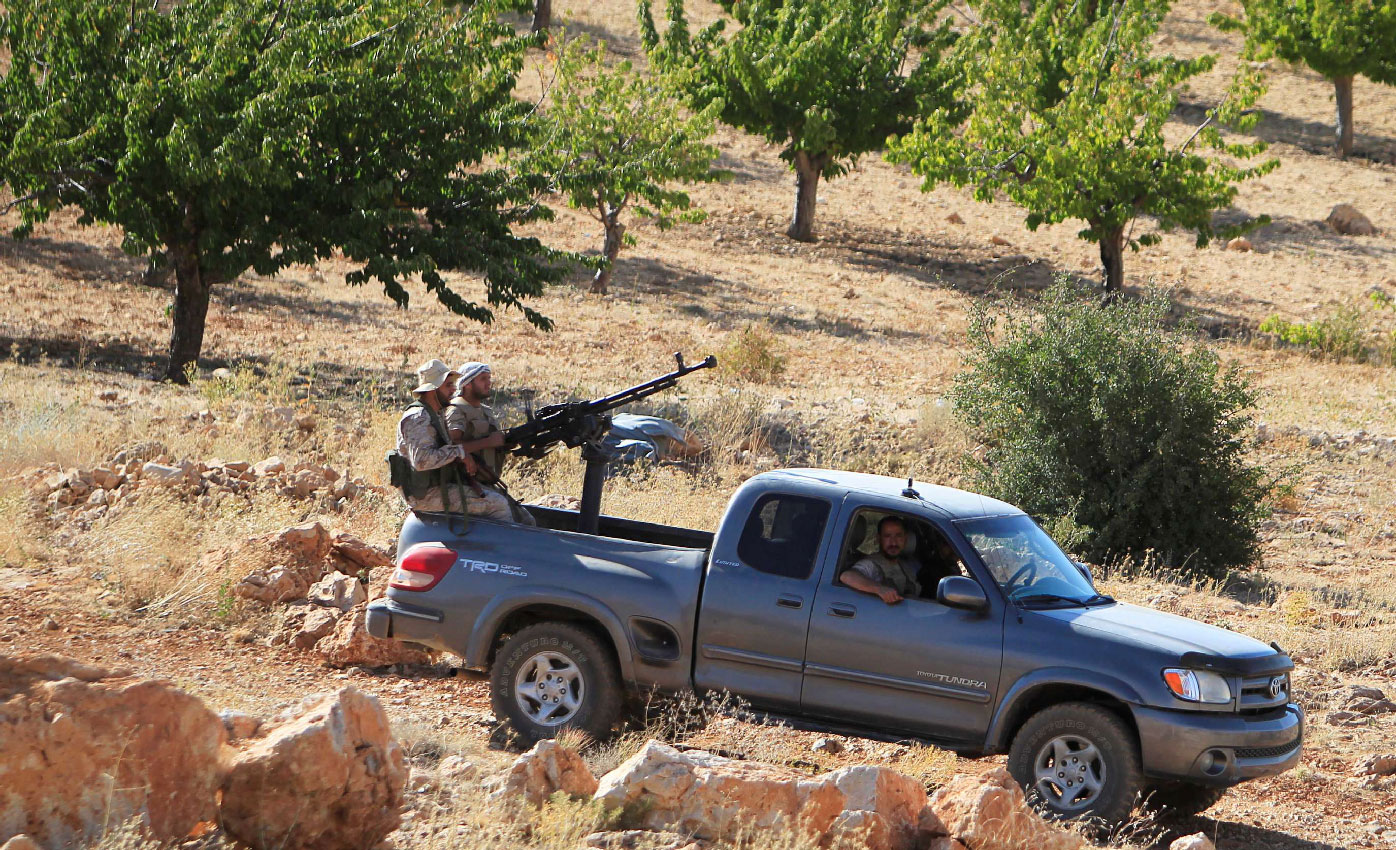 Hezbollah fighters are seen in a truck in Jroud Arsal, near Syria-Lebanon border, August 13, 2017.