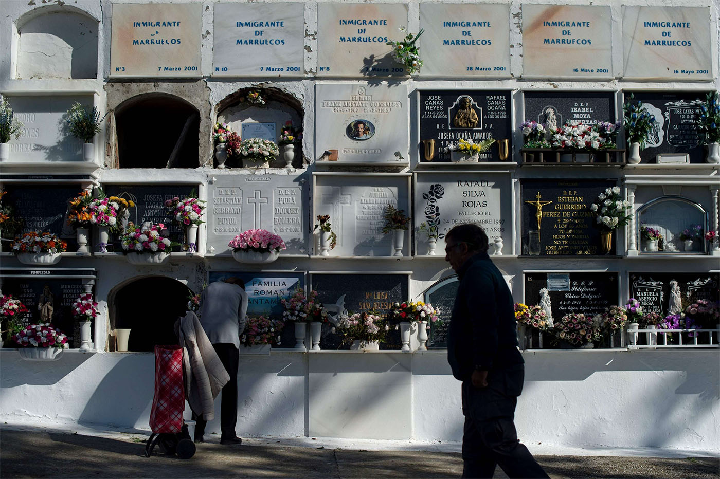 Rows of tombstones at Tarifa's cemetery mark where unnamed migrants are buried