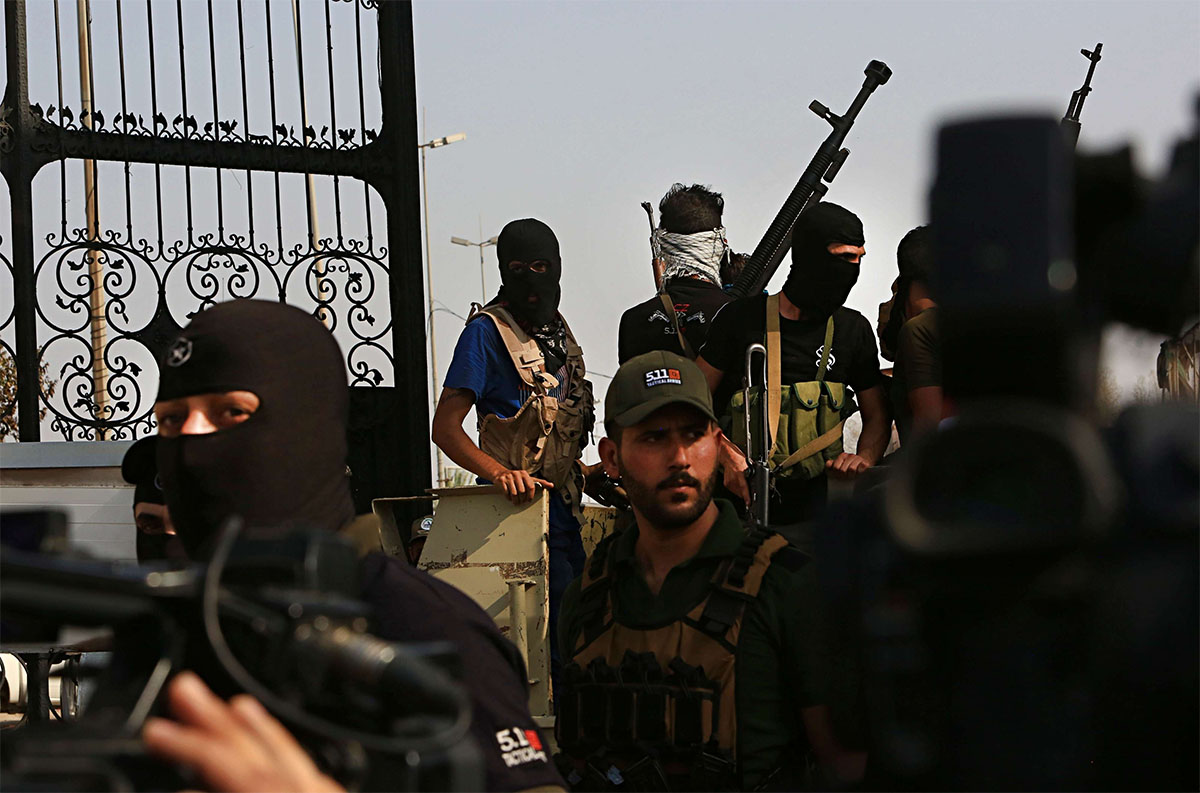 Popular Mobilization Forces parade in Basra