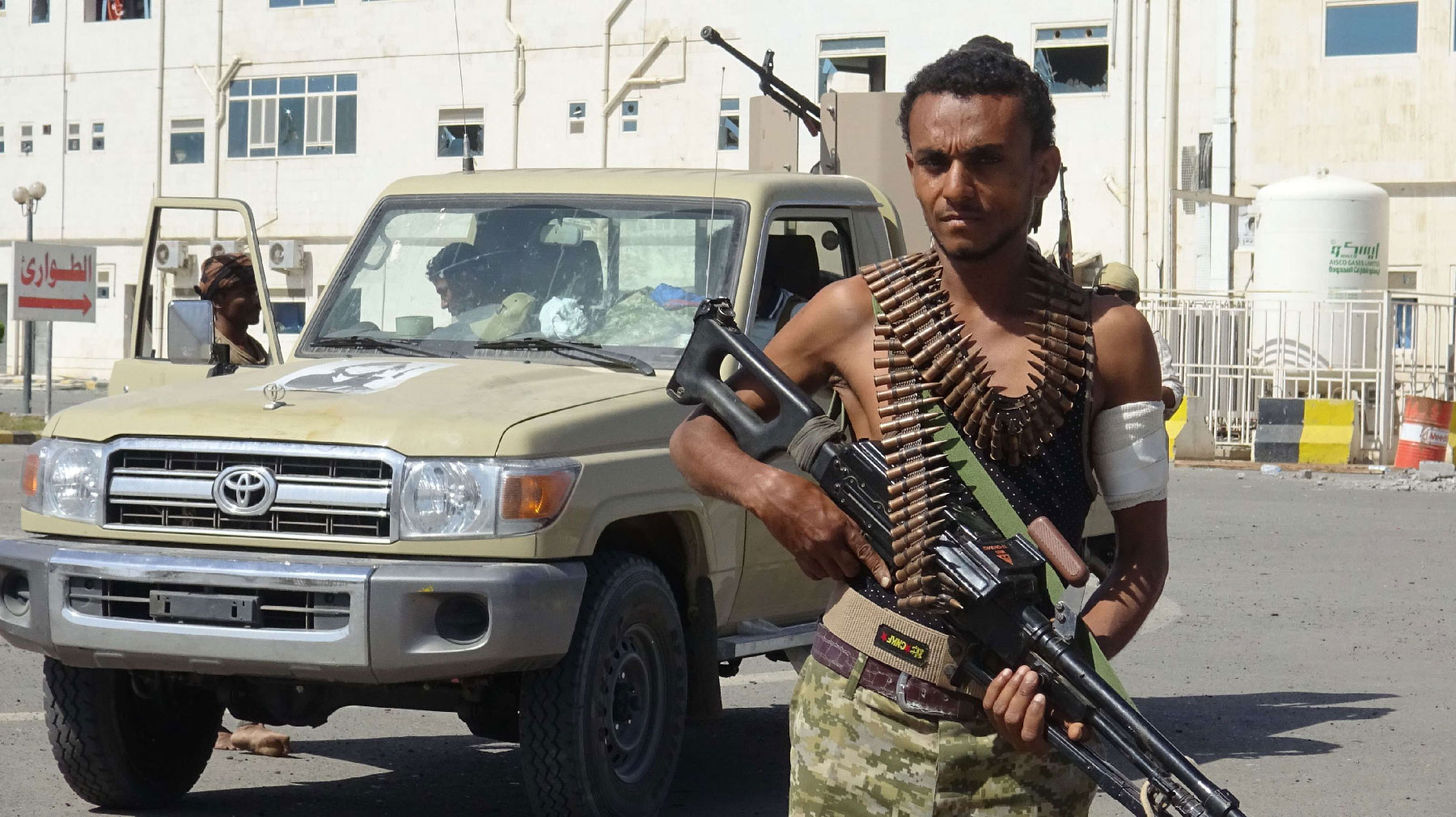A member of the Yemeni pro-government forces is pictured in front of the May 22 Hospital on the eastern outskirts of port city of Hodeida on November 15, 2018. 