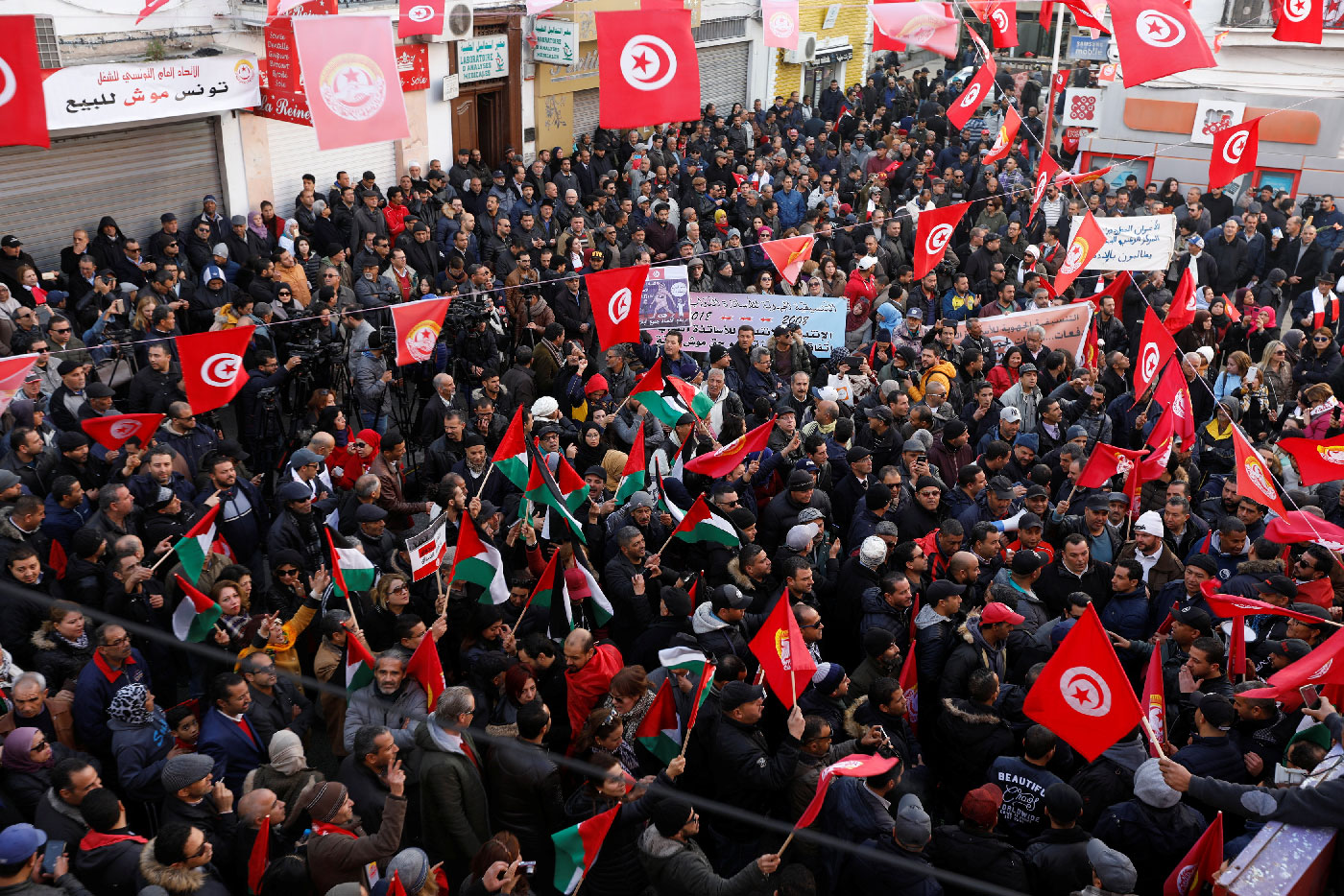People gather during a nationwide strike against the government's refusal to raise wages in Tunis, Tunisia January 17, 2019. 