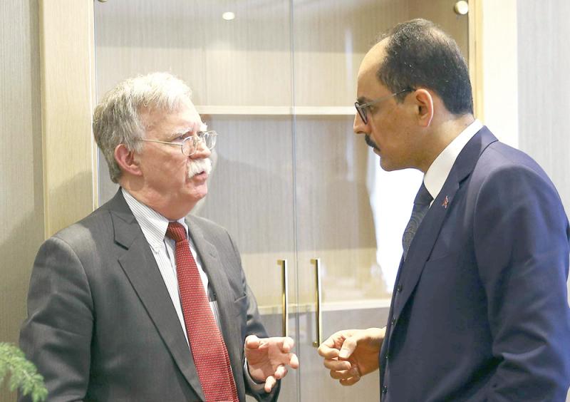 Slighted. US national security adviser John Bolton (L) speaks to Turkish presidential spokesman Ibrahim Kalin (R) following their meeting in Ankara, January 8