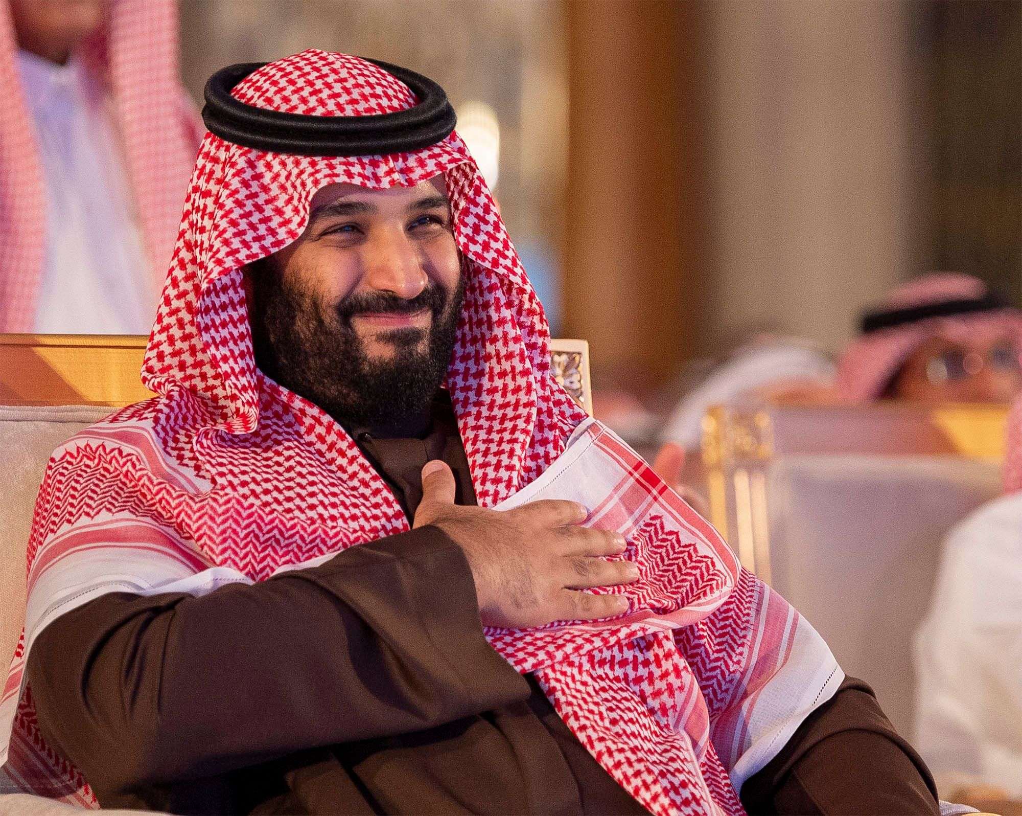 A new investment drive. Crown Prince Mohammed bin Salman bin Abdulaziz (L) signs a document given to him by Energy Minister Khalid al-Falih during a ceremony in Riyadh, January 28.