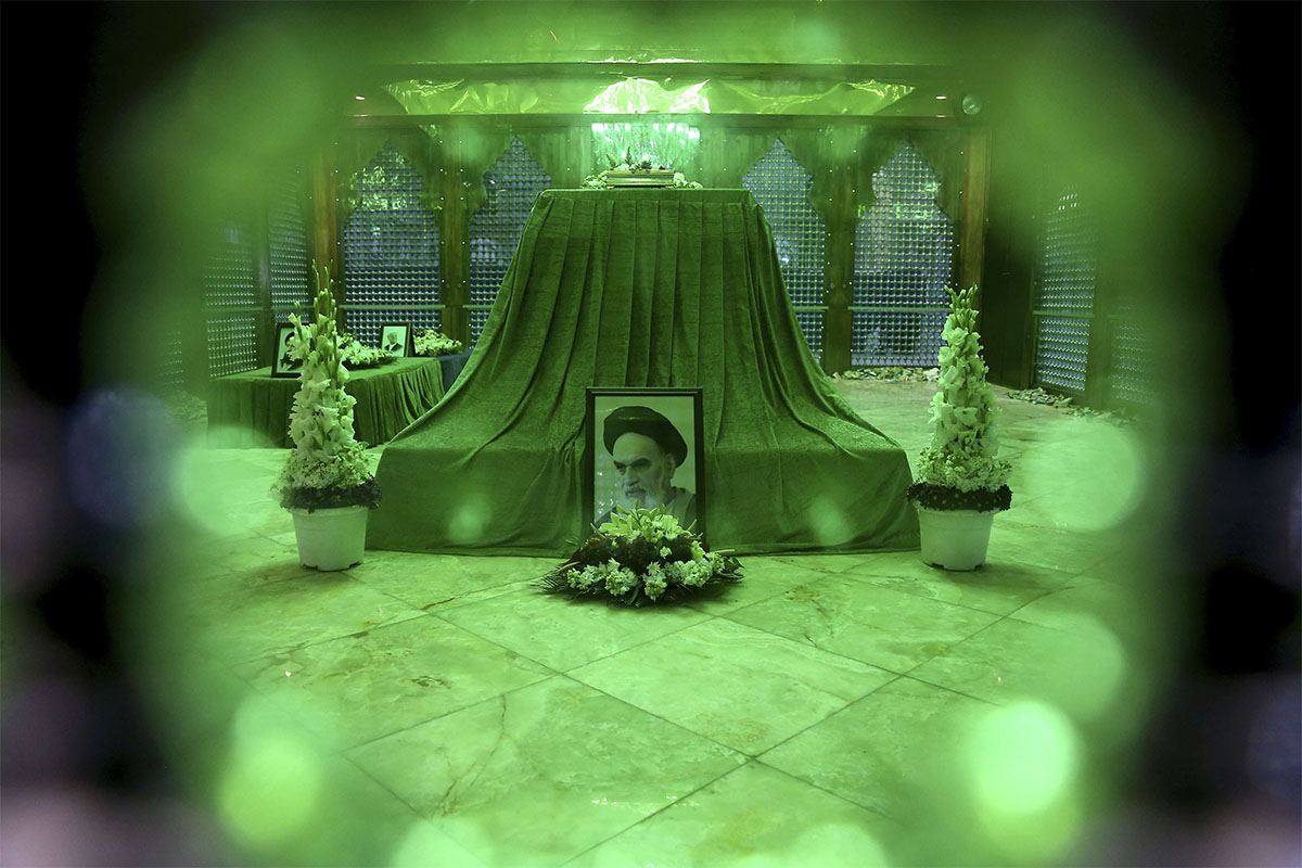 A portrait of Ayatollah Ruhollah Khomeini is displayed at his grave