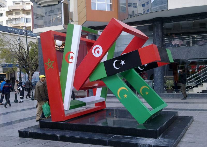 A view of a large structure with flags of five Maghreb countries in the Moroccan city of Oujda