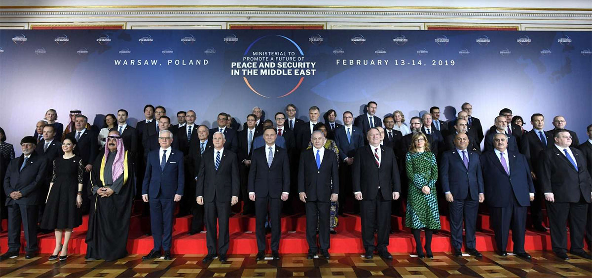  Participants pose for a family photo at the Warsaw Middle East Summit
