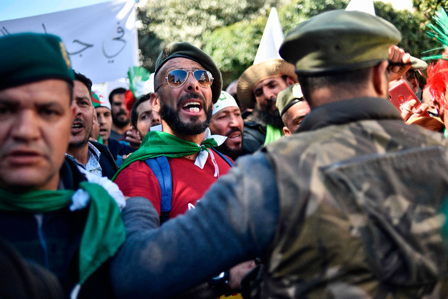 Veteran soldiers from Algeria's civil war take part in a demonstration against ailing President Abdelaziz Bouteflika in the capital Algiers on March 29, 2019.