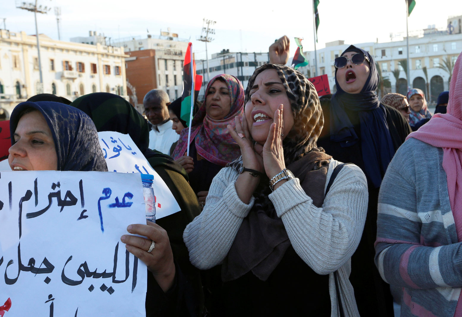 Libyan women chant slogans against General Khalifa Haftar from Libyan National Army during a protest in Tripoli, Libya March 8, 2019. 