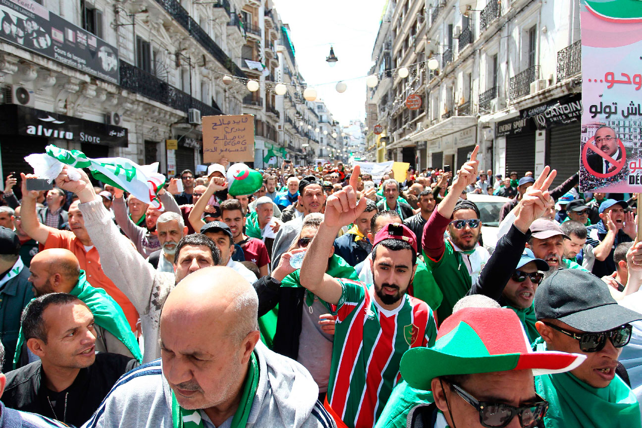 Algerians gather during an anti government demonstration in the capital Algiers 