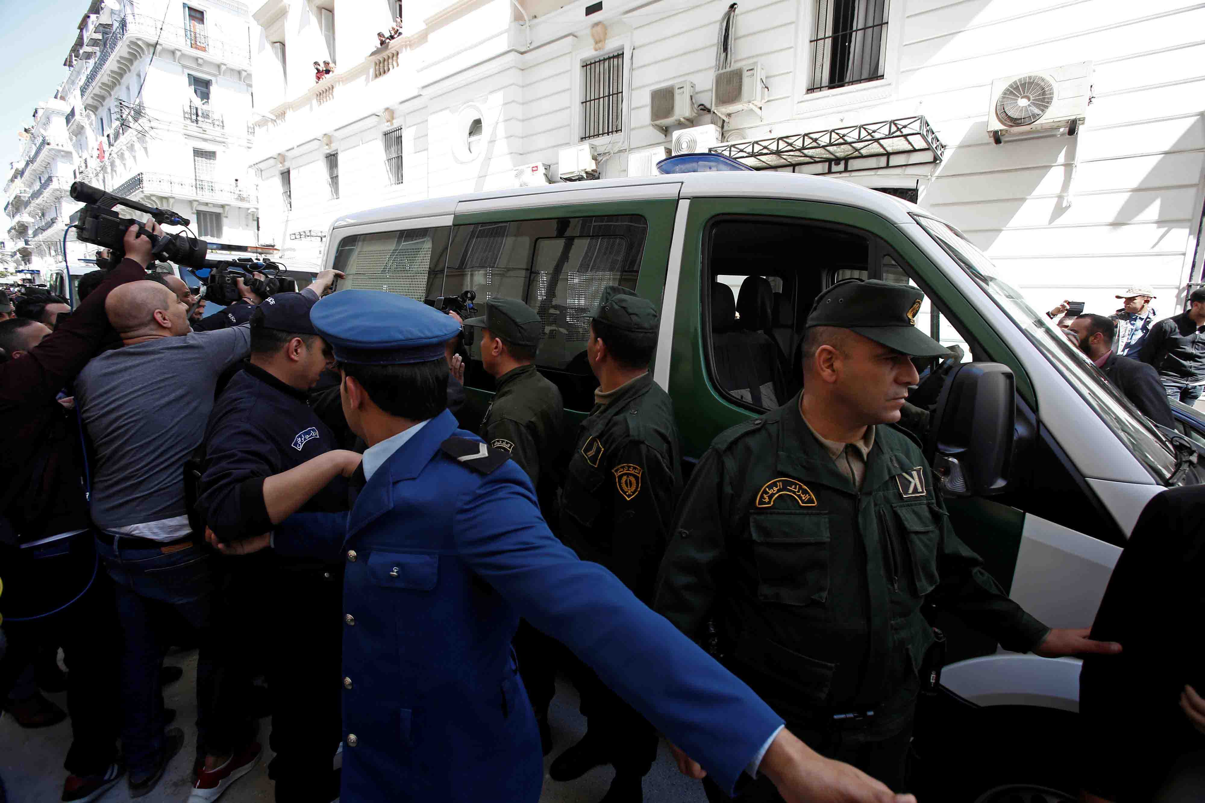 The former central bank governor is the first government official to appear before prosecutors since mass protests