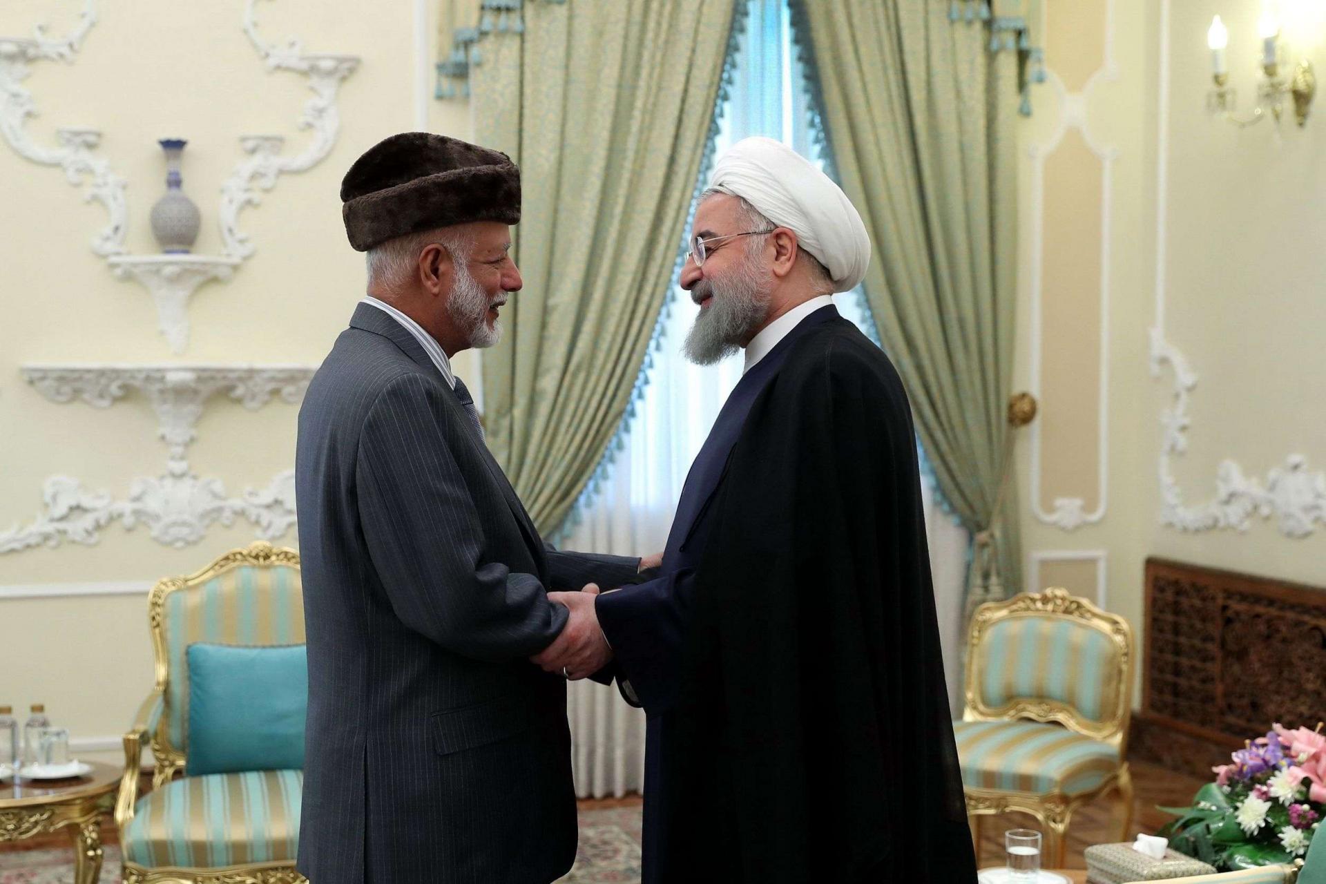 وزير الخارجية العماني يوسف بن علوي والرئيس الايراني حسن روحاني