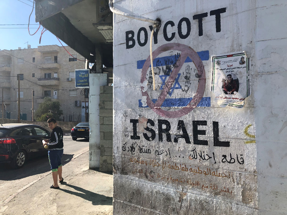 Graffiti calling for boycotting Israel in Bethlehem, in the Israeli-occupied West Bank