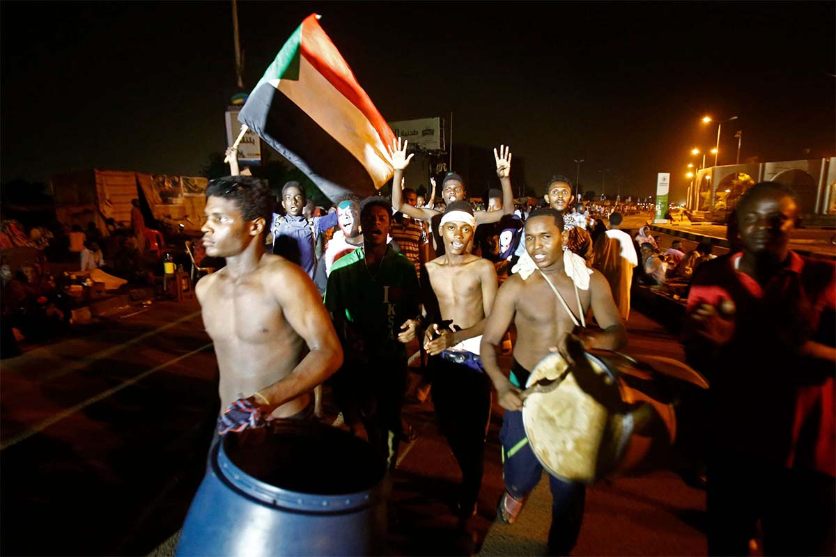 Sudanese gather during demonstration outside the army headquarters in Khartoum 