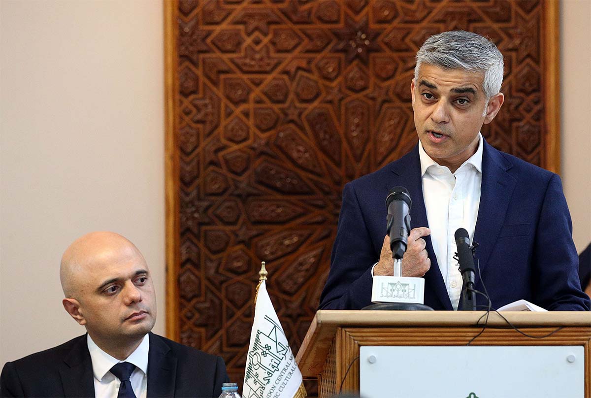 London Mayor Sadiq Khan (R) and British Home Secretary Sajid Javid