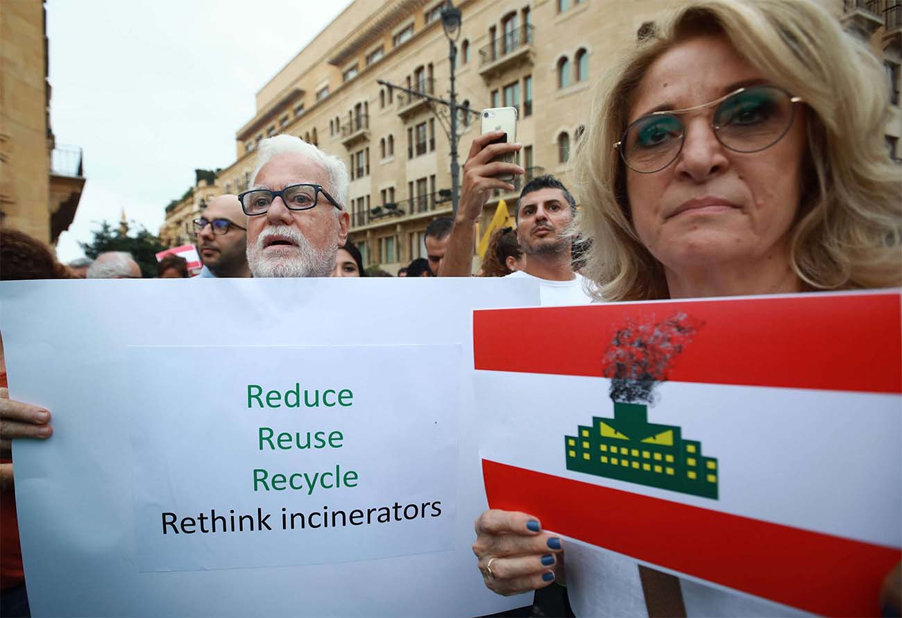 A group of Lebanese activists demonstrate in central Beirut to denounce a plan by authorities to install waste incinerators in the country