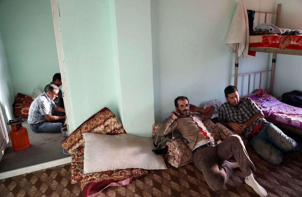 الأزمة المالية تدفع عمالا إيرانيين للهجرة إلى كردستان العراق
