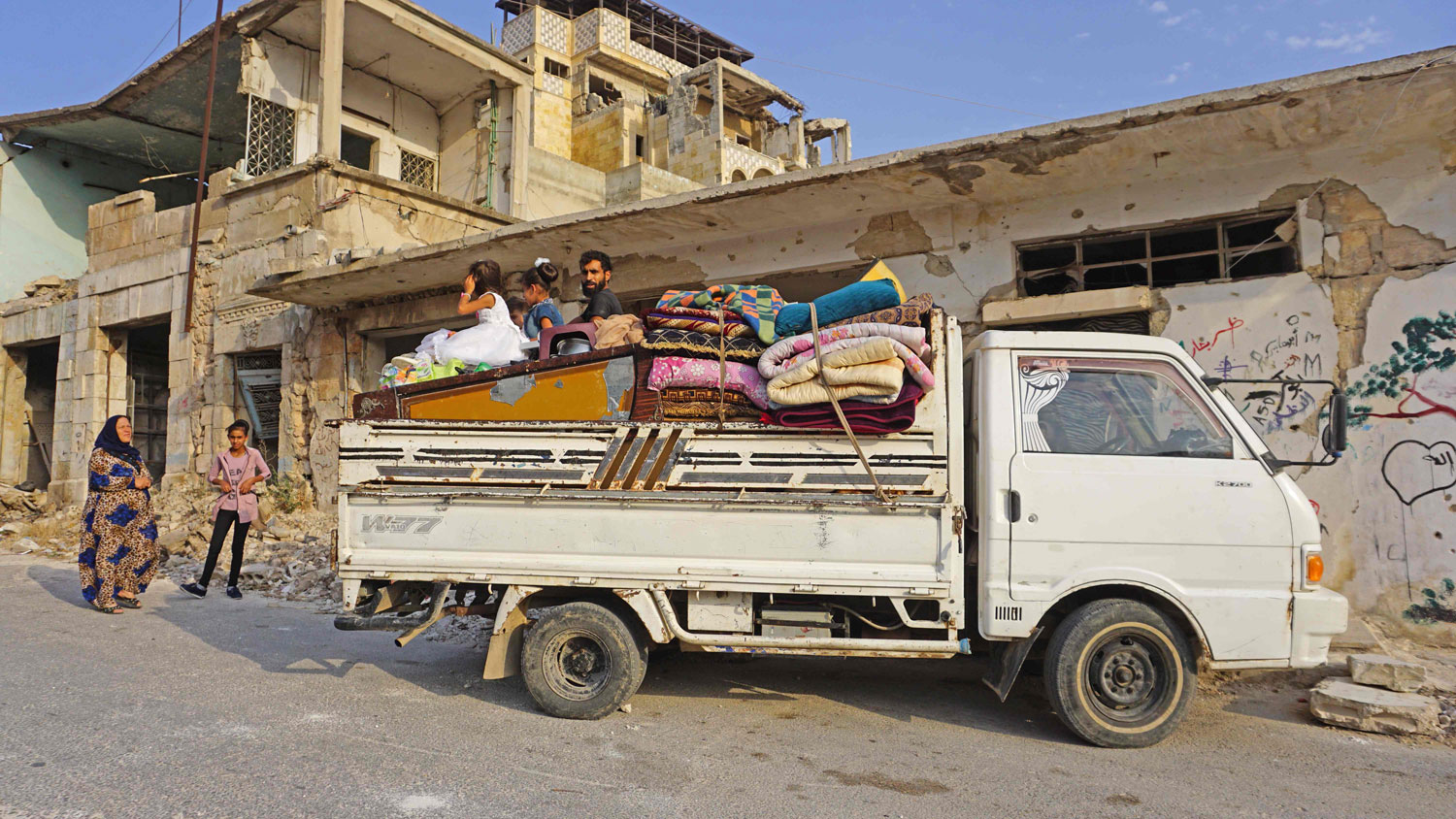 A Syrian displaced family, who fled their hometown of Khan Sheikhun