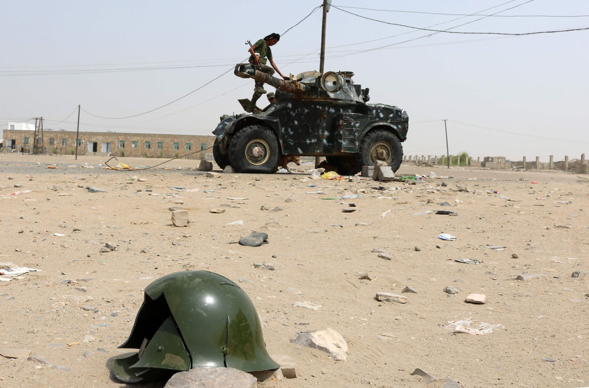 A Fighter with the UAE-trained Security Belt Forces loyal to the pro-independence Southern Transitional Council (STC), stands atop a military vehicle 