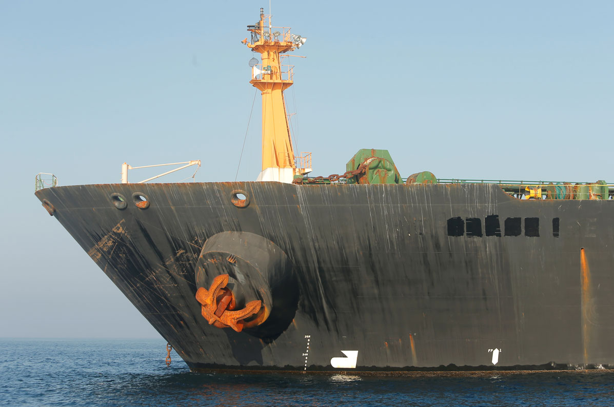 The name of Iranian oil tanker Grace 1 is seen removed as it sits anchored in the Strait of Gibraltar