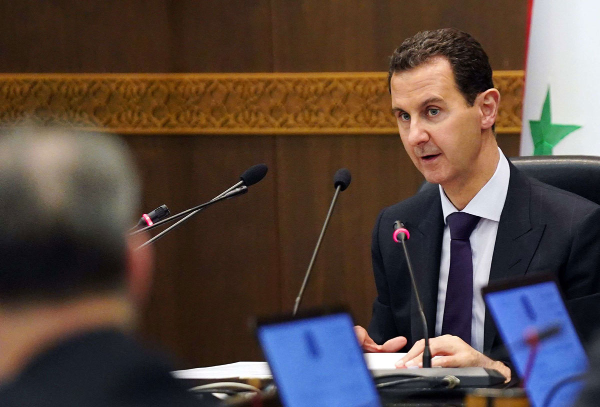 President Bashar al-Assad heading a cabinet meeting in the Syrian capital Damascus
