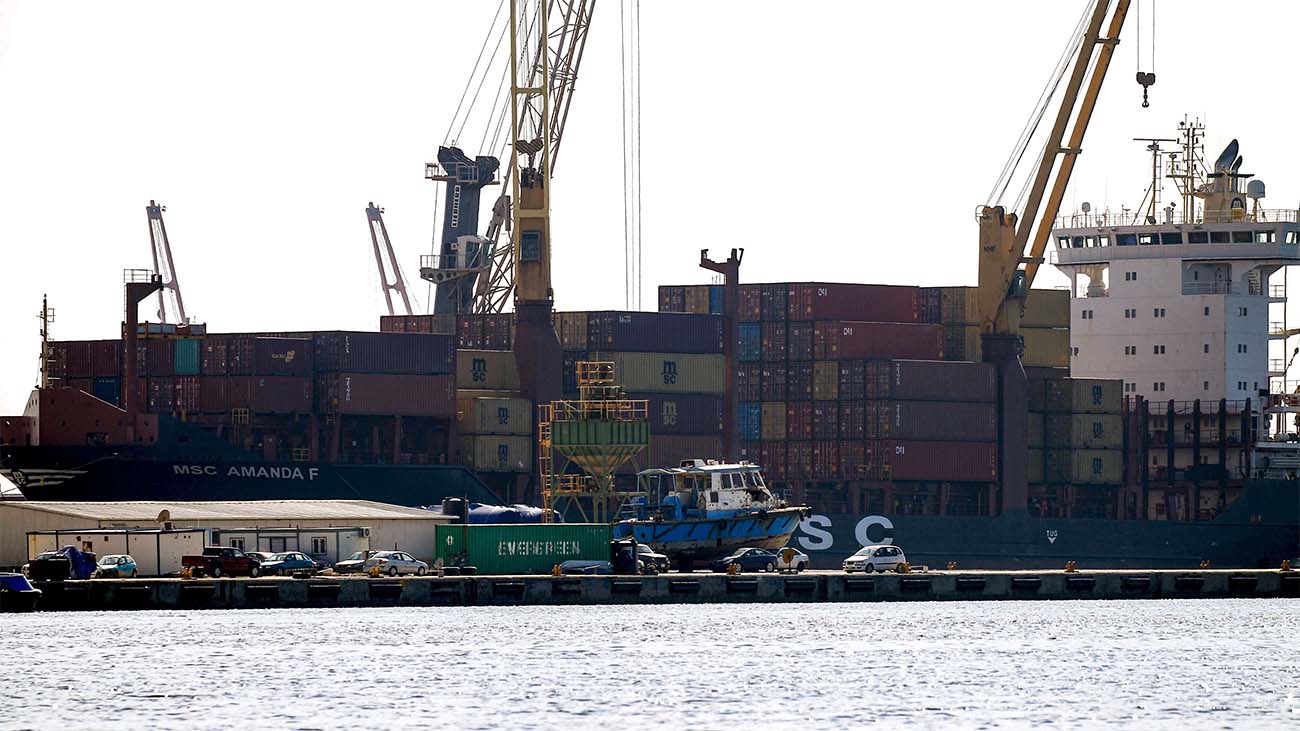 A container ship moored in the harbour of the eastern Libyan port city of Benghazi