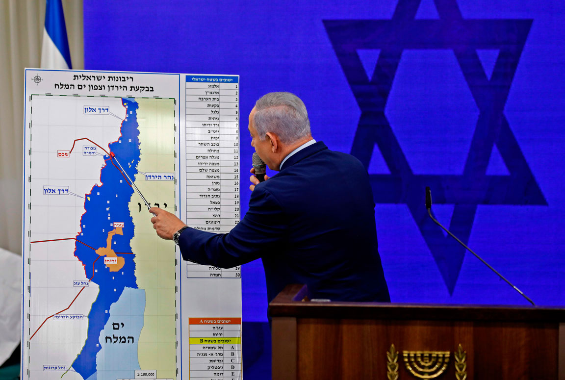 Netanyahu points at a map of Palestine's Jordan Valley