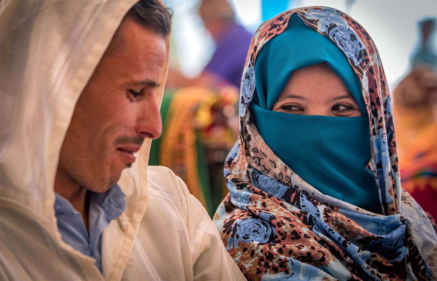 A young Berber couple wait for their wedding ceremony in Imilchil 