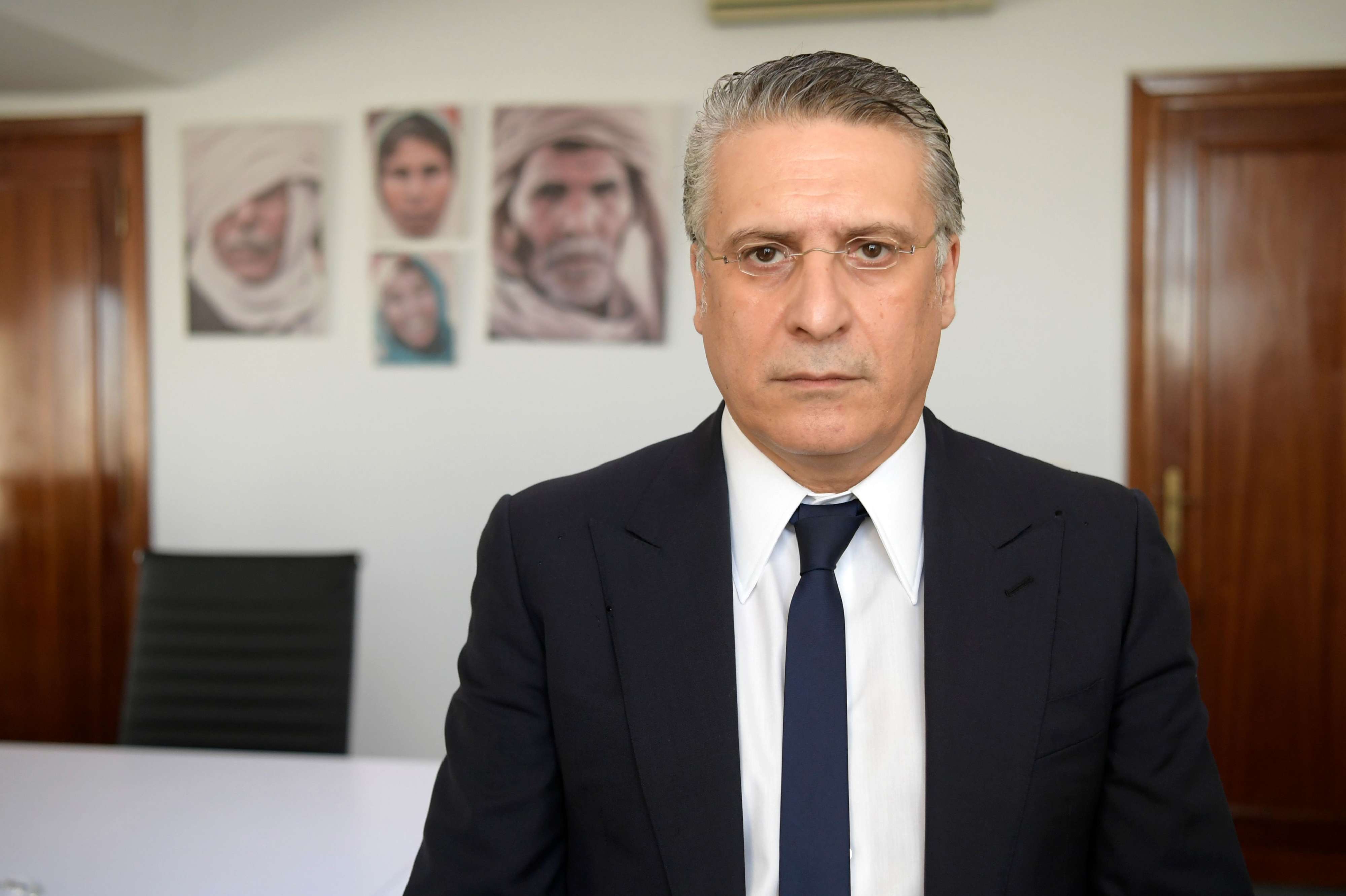 نبيل القروي مرشح من وراء القضبان يمر للدور الثاني في منافسة قيس سعيد