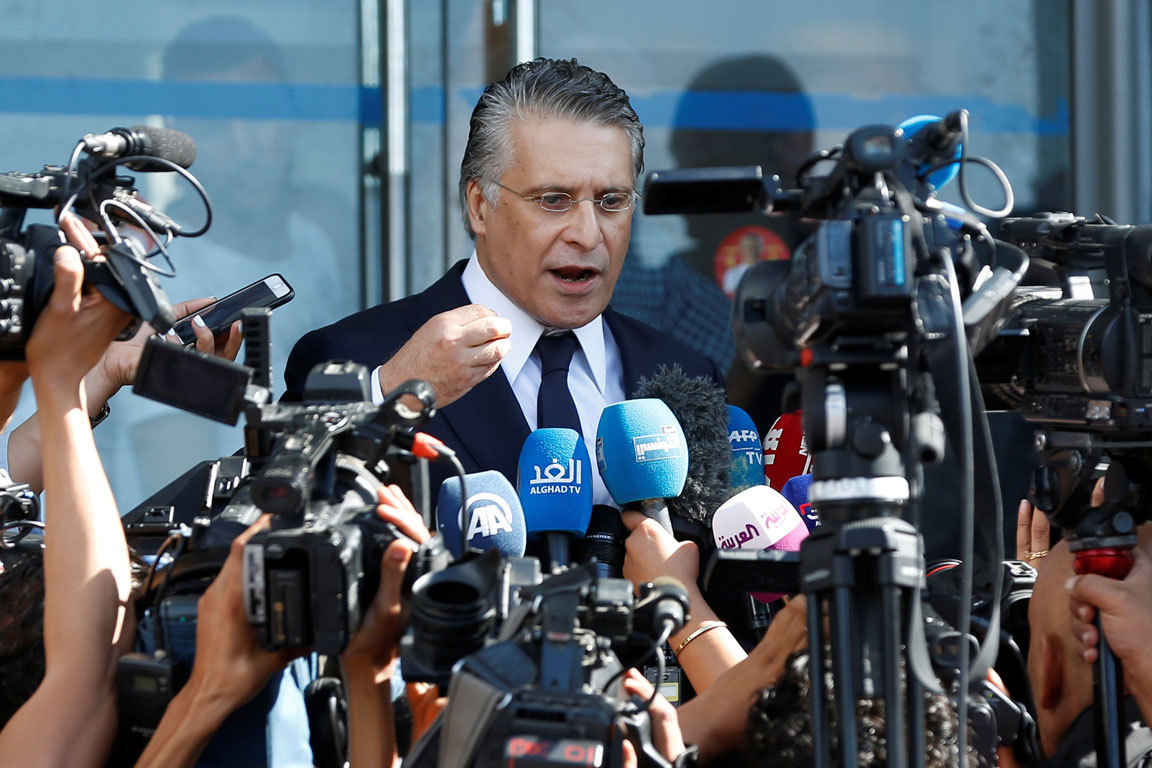 Tunisian presidential candidate Nabil Karoui speaks during a news conference in Tunis