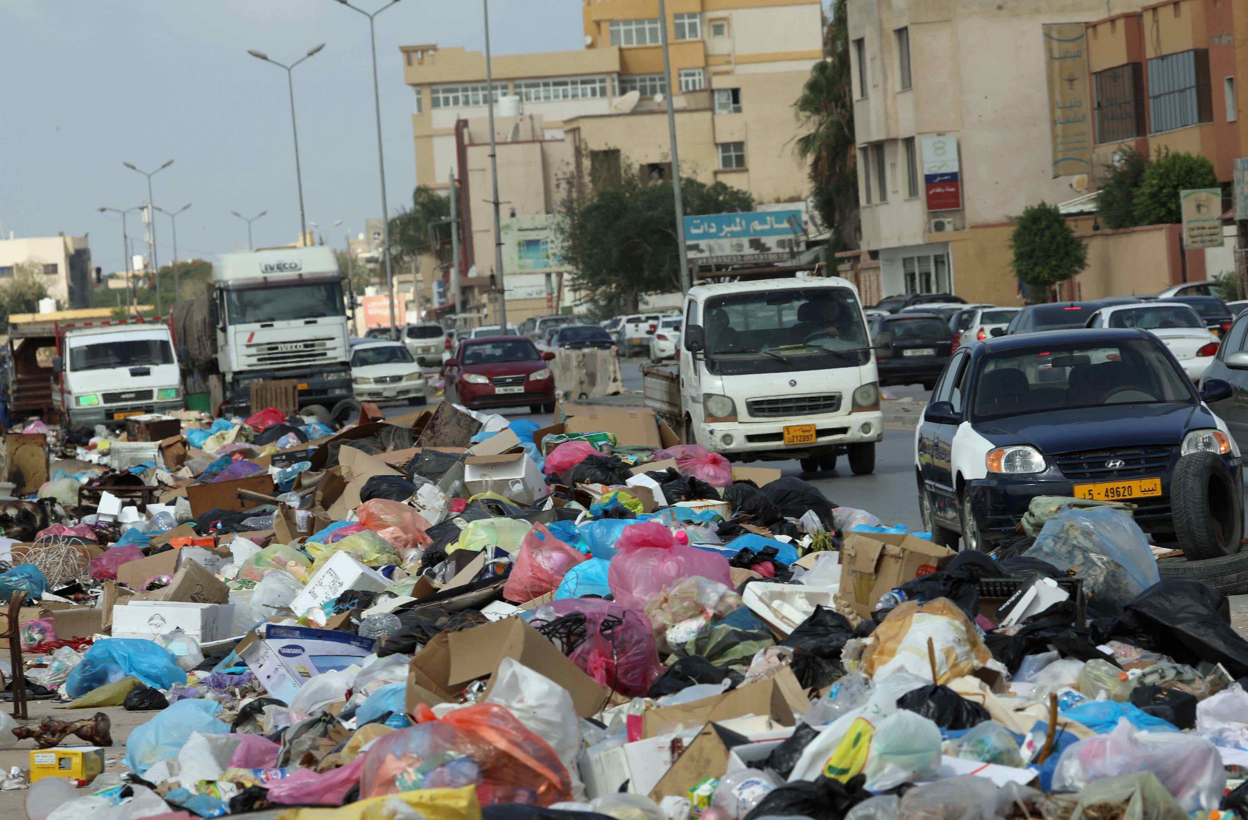 Despite ongoing, sporadic fighting on the city's outskirts, life in central Tripoli continues largely as before