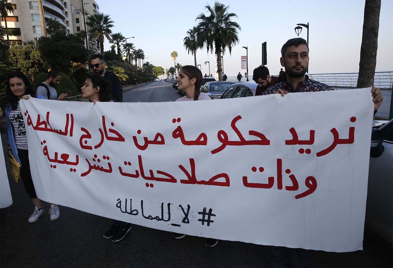 Anti-government protesters block a main highway