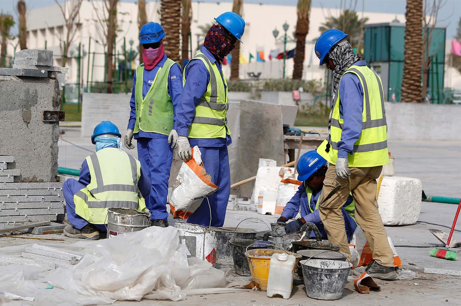 Migrant workers are treated in Qatar according to their racial identity
