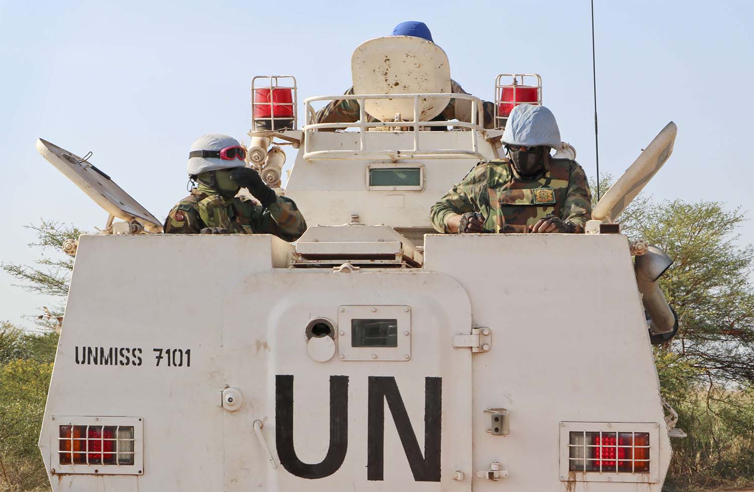 UN peacekeepers in an armored personnel carrier lead a patrol from Bentiu towards the village of Nhialdiu