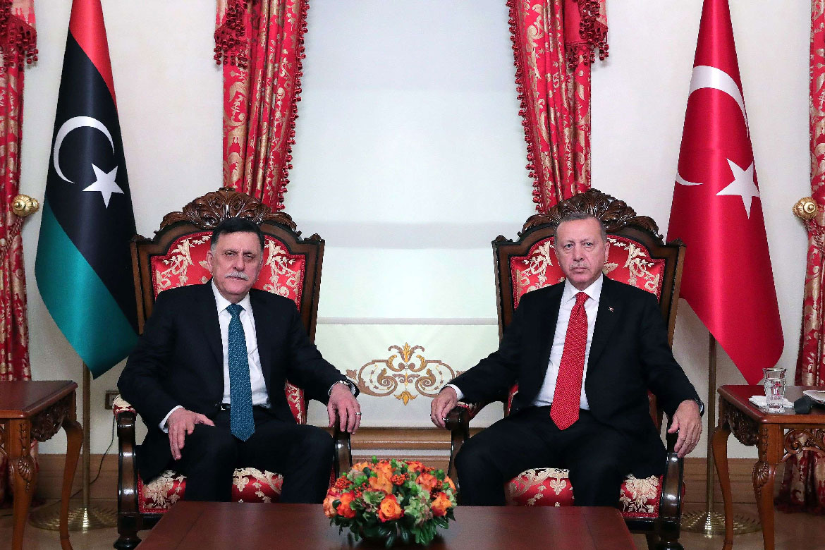 Turkish President Recep Tayyip Erdogan (R) and GNA head Fayez al-Sarraj (L)