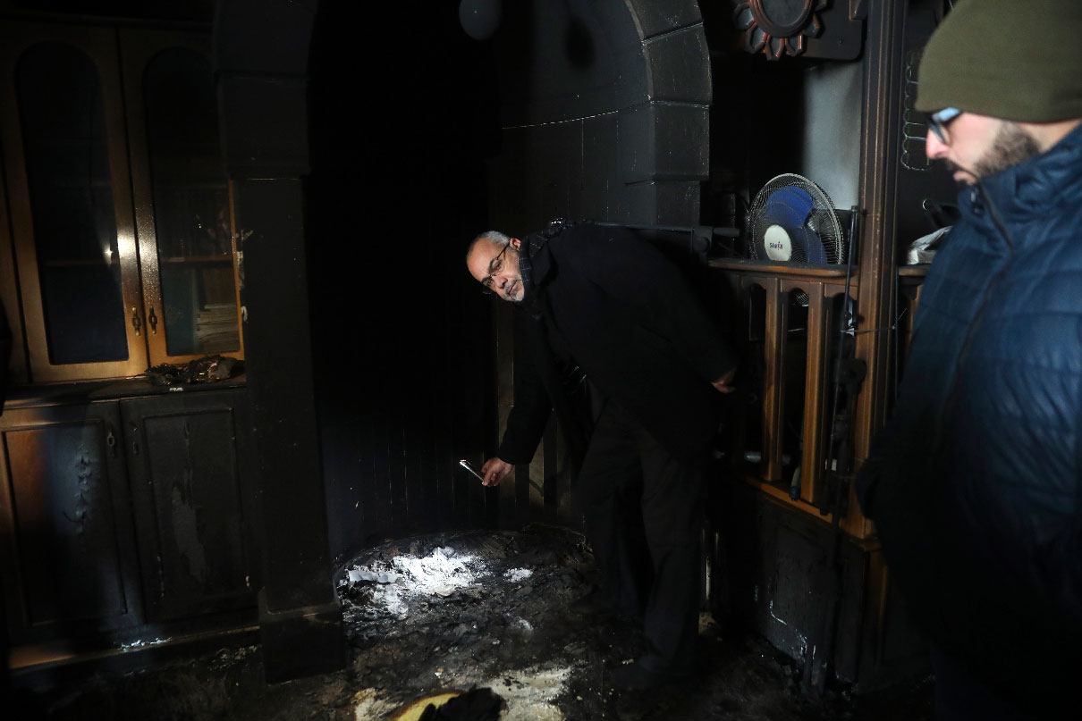 Palestinians visit torched mosque in the neighborhood of Beit Safafa