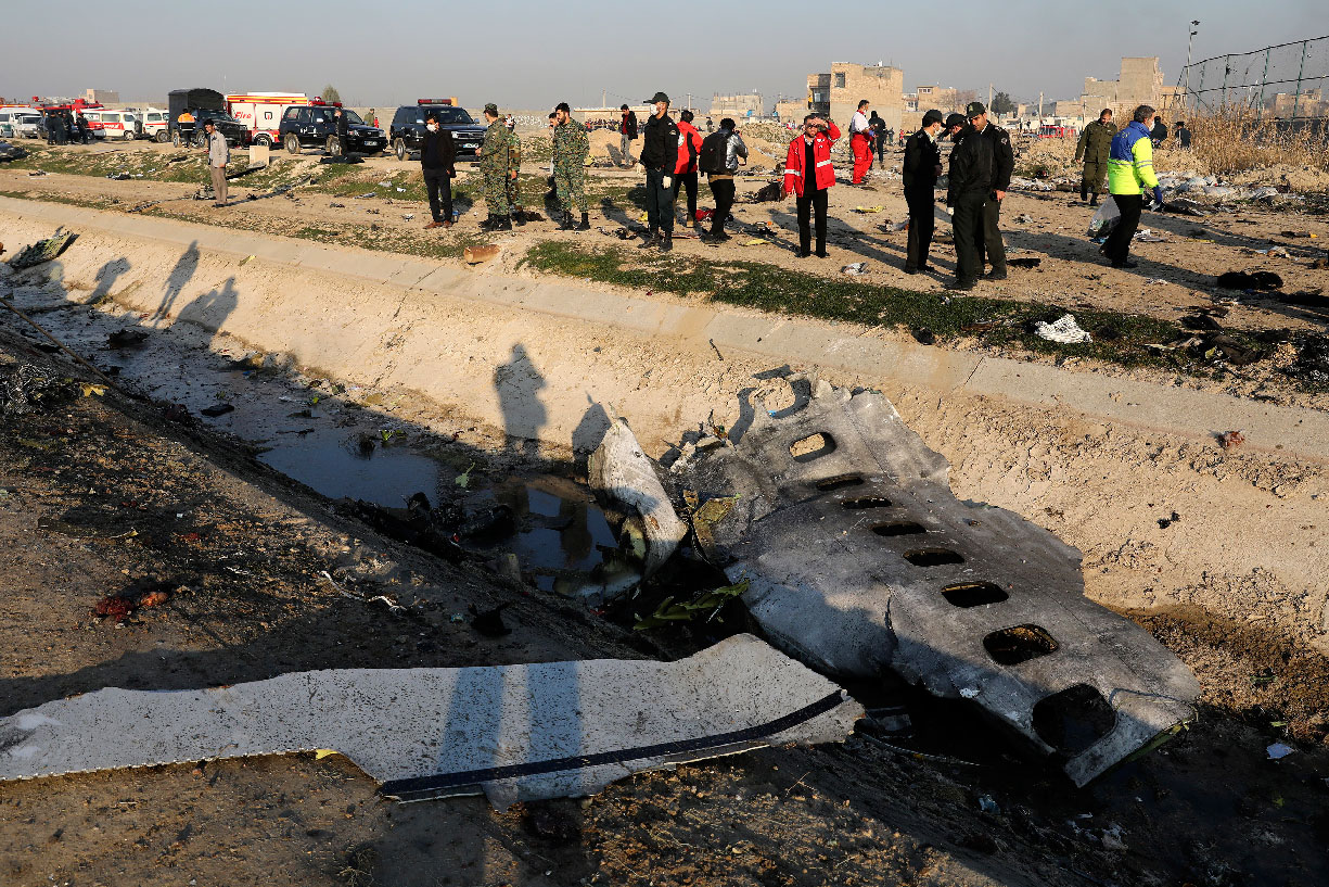 Debris at the scene where a Ukrainian plane crashed in Shahedshahr, Iran
