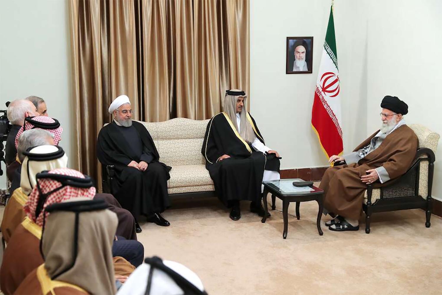 Supreme Leader of Iran Sayyid Ali Hosseini Khamenei (R) meets with Emir of Qatar Tamim bin Hamad Al Thani in Tehran