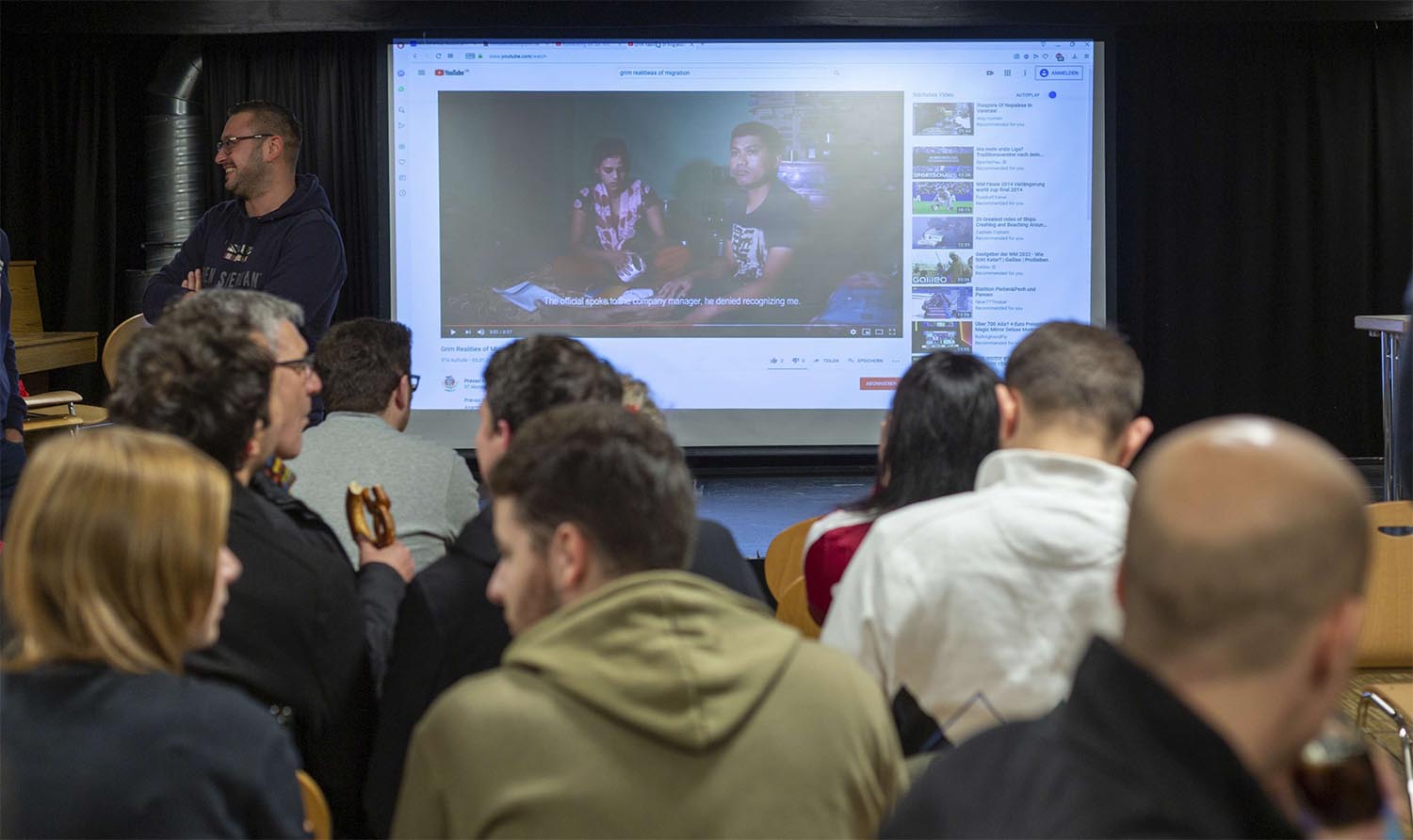 Bayern Munich fans gather for a panel discussion on the club’s sponsorship links with Qatar and its lack of response to alleged human rights abuses in the country